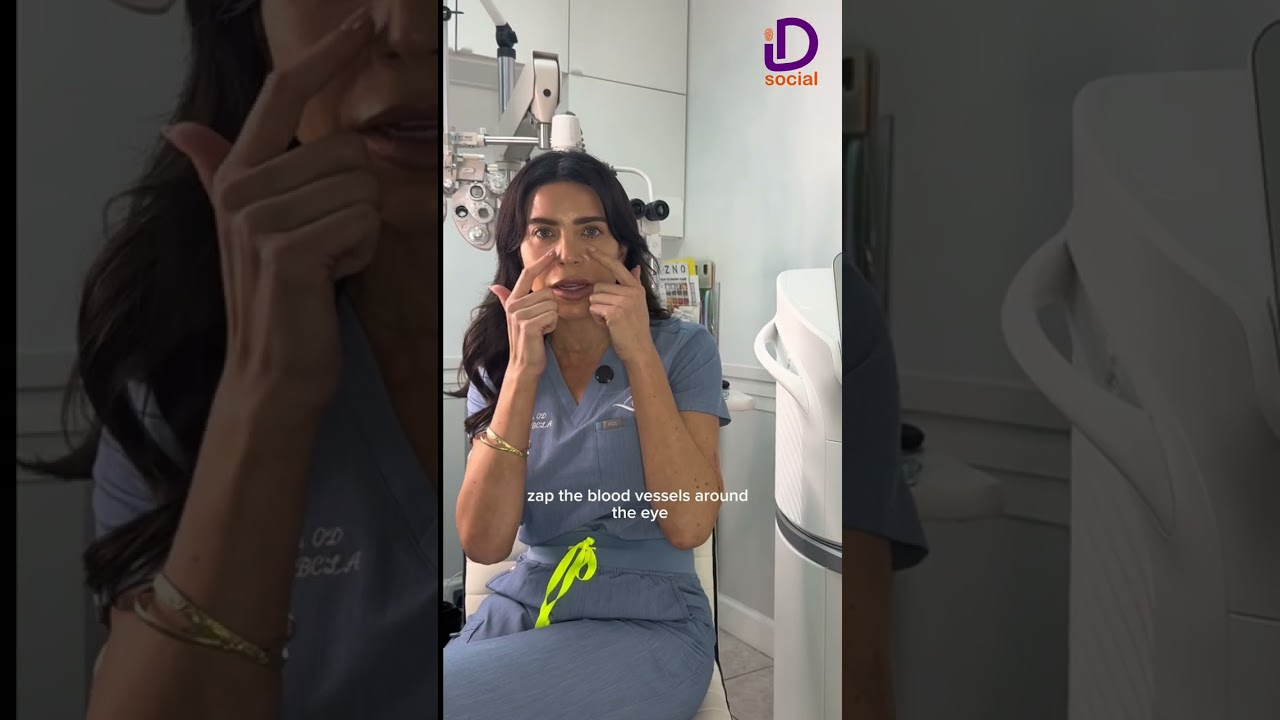 Optometrist explaining a treatment in an exam room